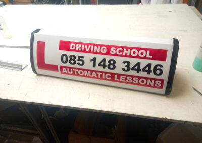 automatic driving school roofsign