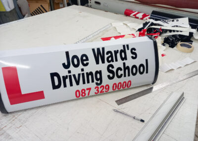 joe ward driving school roofsign