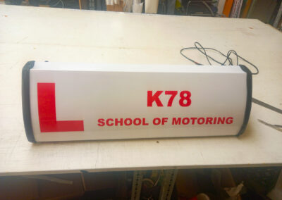 k78 driving school roofsign