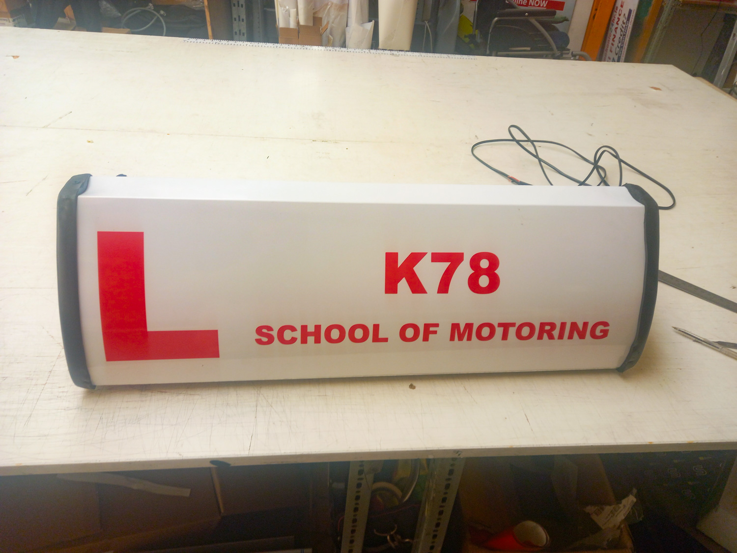 k78 driving school roofsign