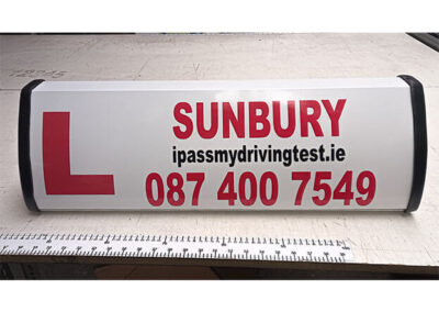 sunbury driving school roof sign
