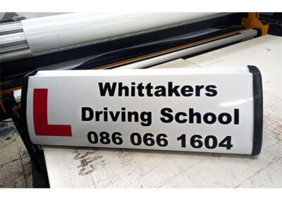 whittakers driving school roofsign with magnets